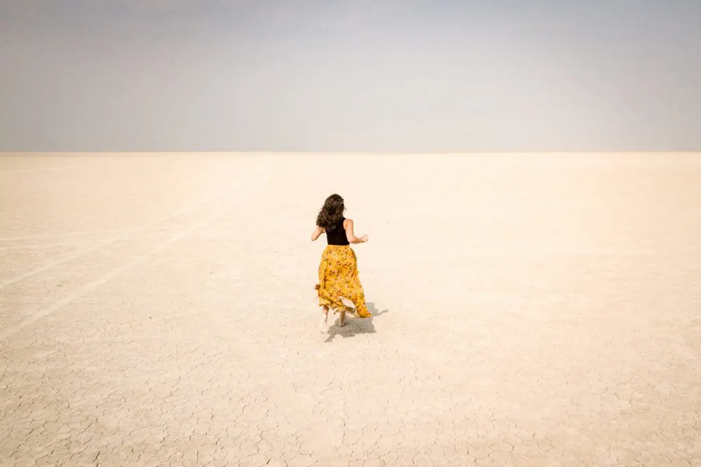 Women running in Alvord Desert