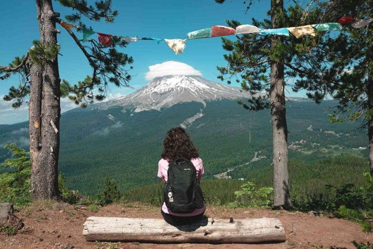 Nina looking out to Tom, Dick and Harry mountain from viewpoint