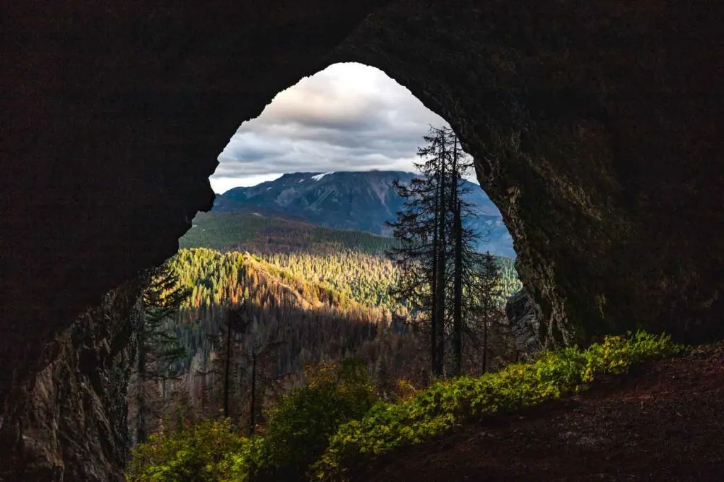 Triangulation peak view through cave entrance