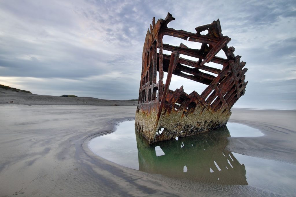 Rusty ship nose on the beach in Fort Stevens State Park