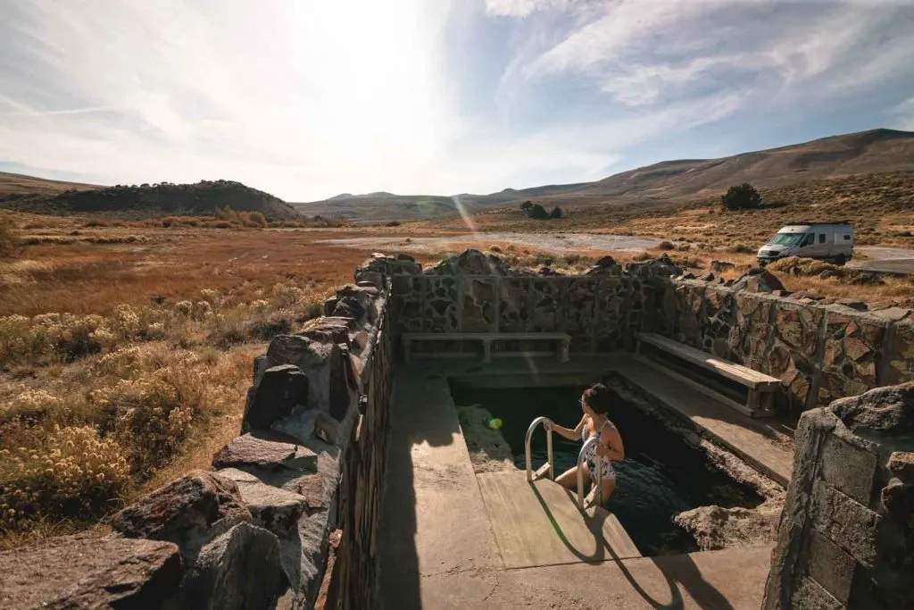 Relax at the Hart Mountain hot springs after a long day on your Oregon road trip.