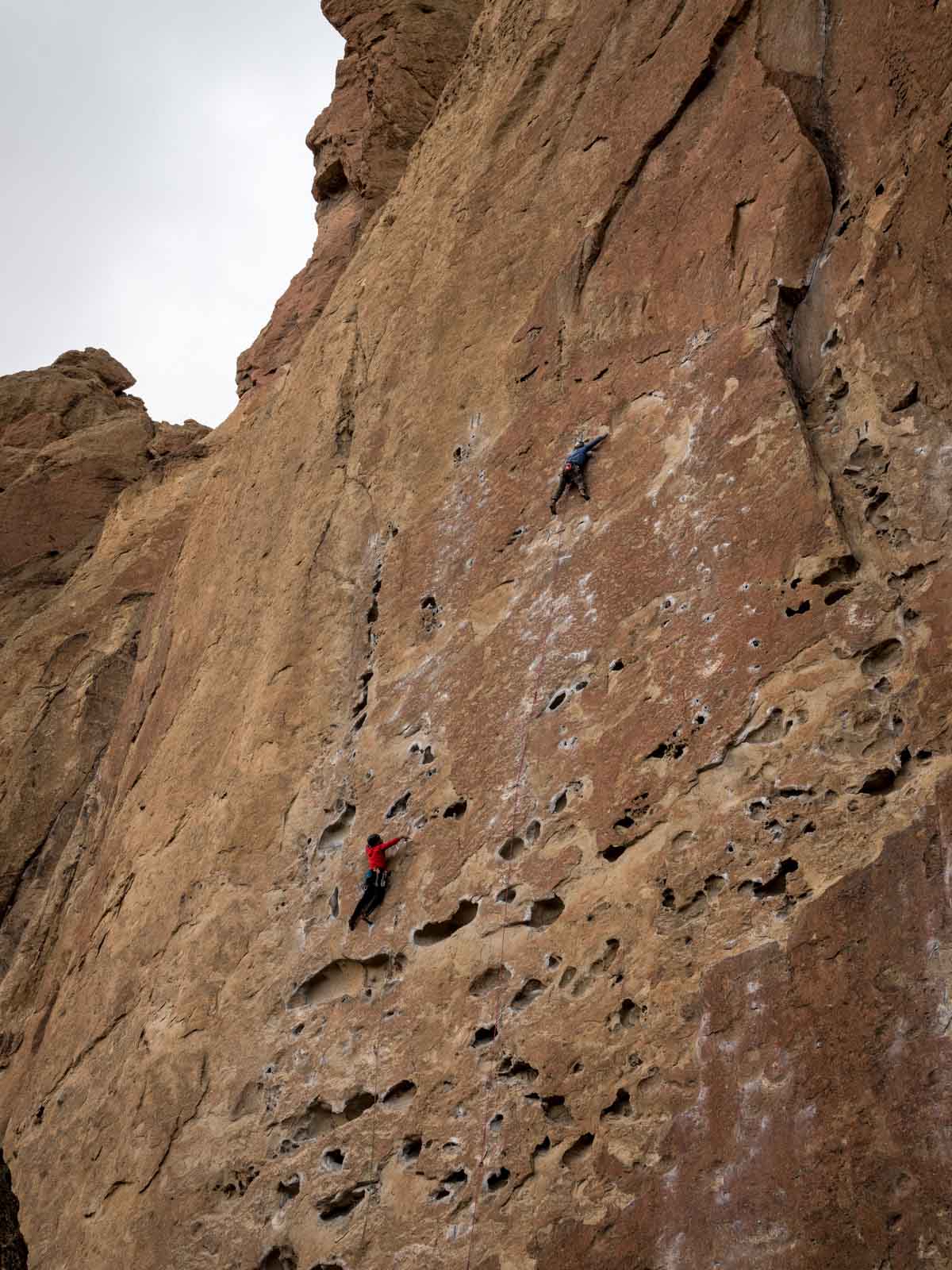 People rock climbing on Smith Rock — add this to your list if you’re wondering what to do in Bend