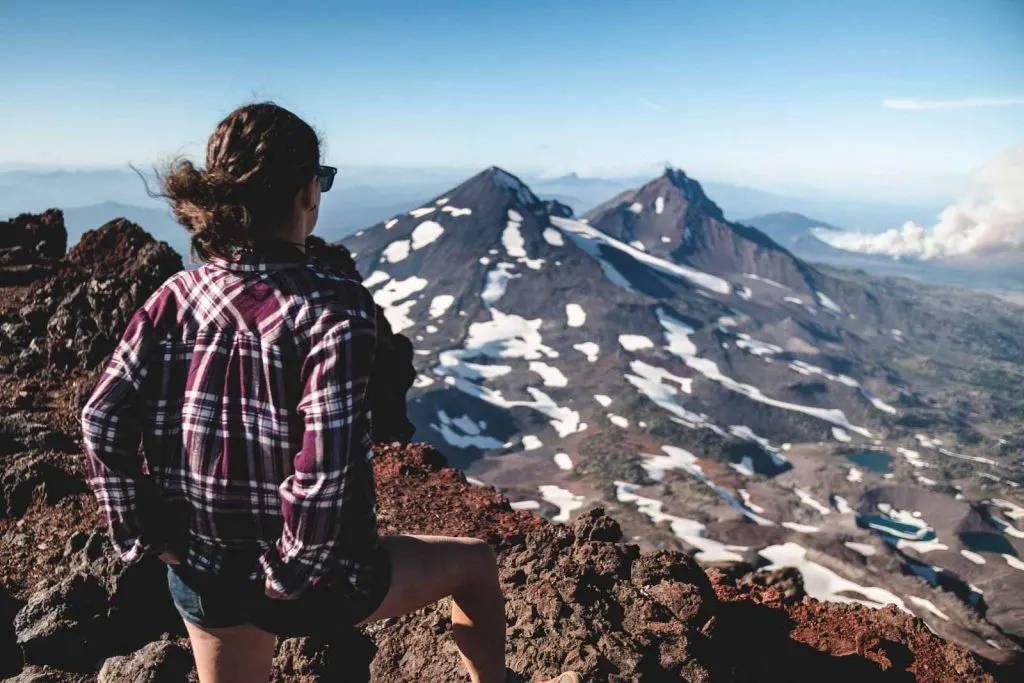 Me looking at a mountain top in Bend — a picturesque thing to do in Bend