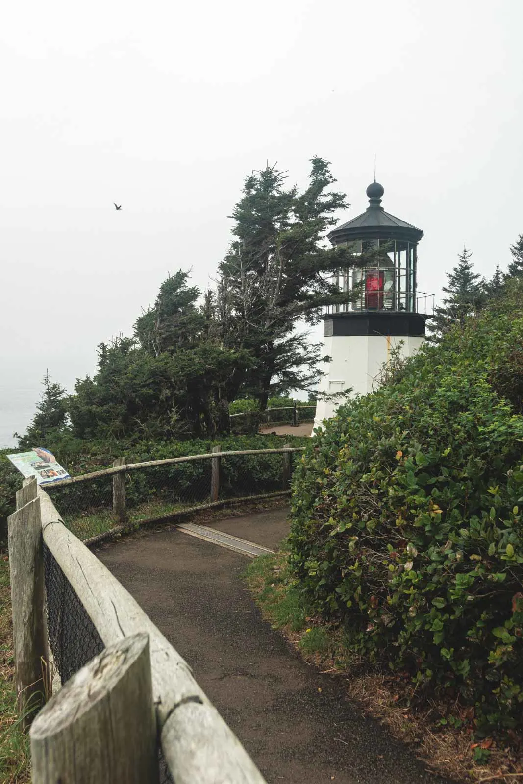 Cape Meares Lighthouse Oregon on a Foggy Day. View of track and Cape Meares Lighthouse, a must visit Oregon Lighthouse