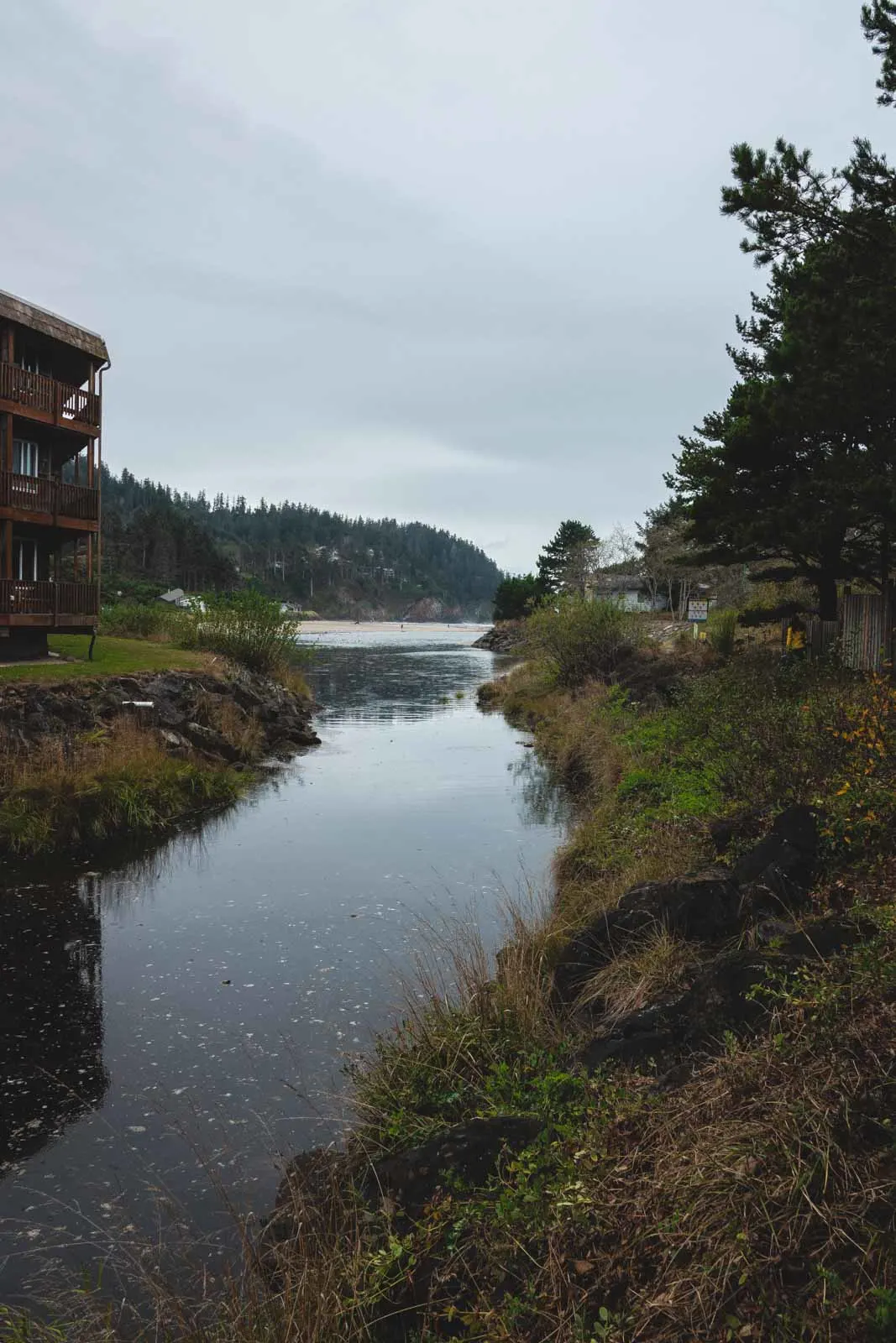Stream with building on the banks at Neskowin Beach, one of the best beaches on the Oregon Coast