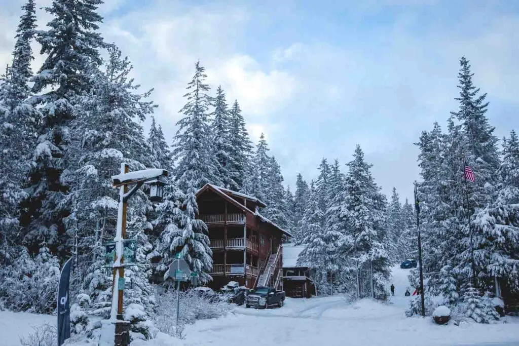 Building surrounded by snow and trees at Summit Ski Area in Oregon