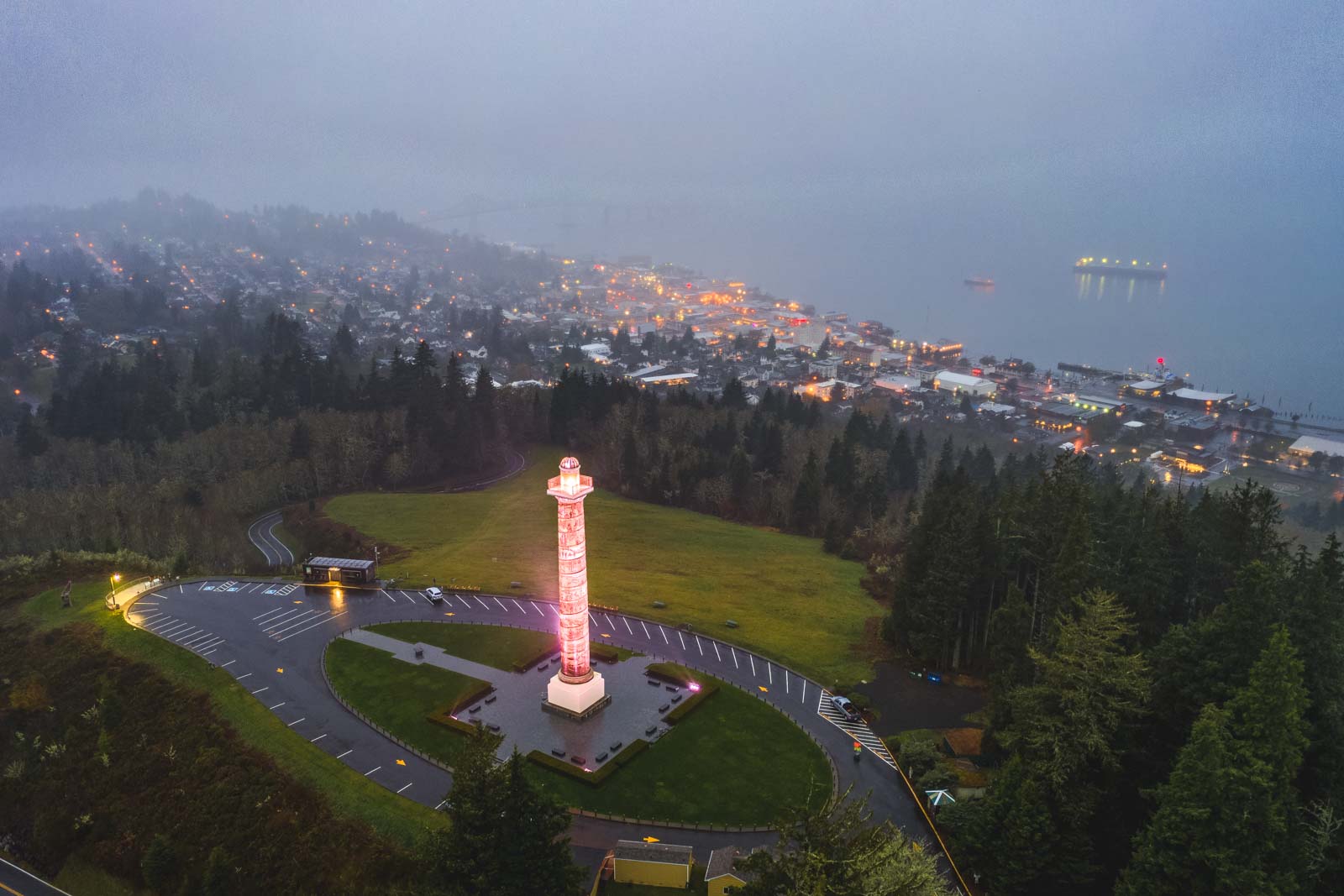 Aerial view of the Astoria Column lit up in Astoria a coastal town in Oregon