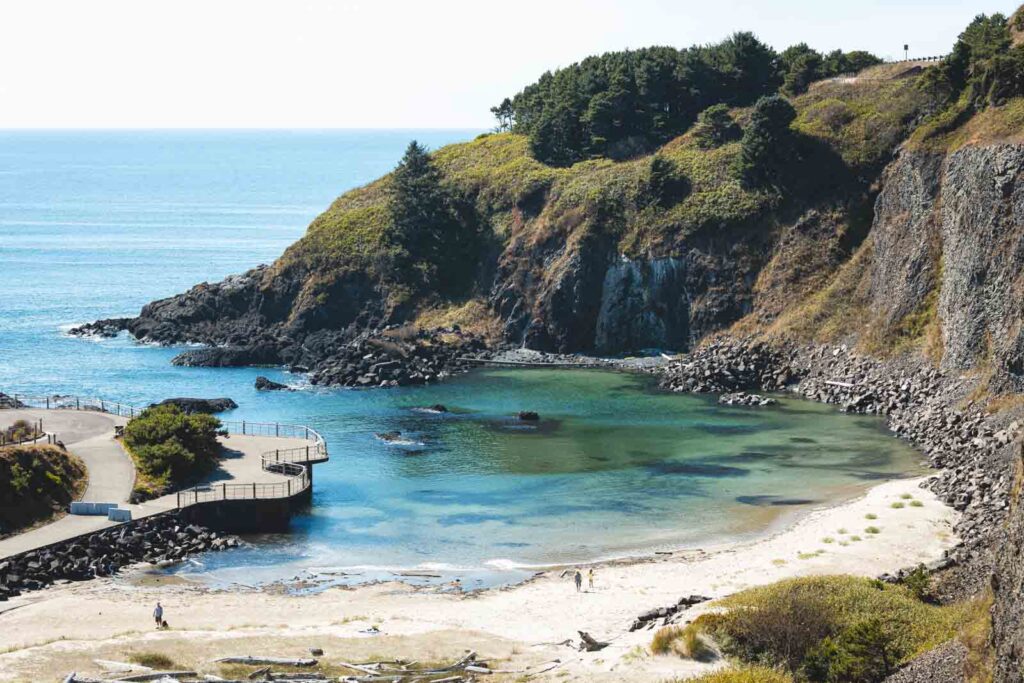 Quarry Cove showing it's turquoise blue water near Yaquina Head Lighthouse in Oregon.