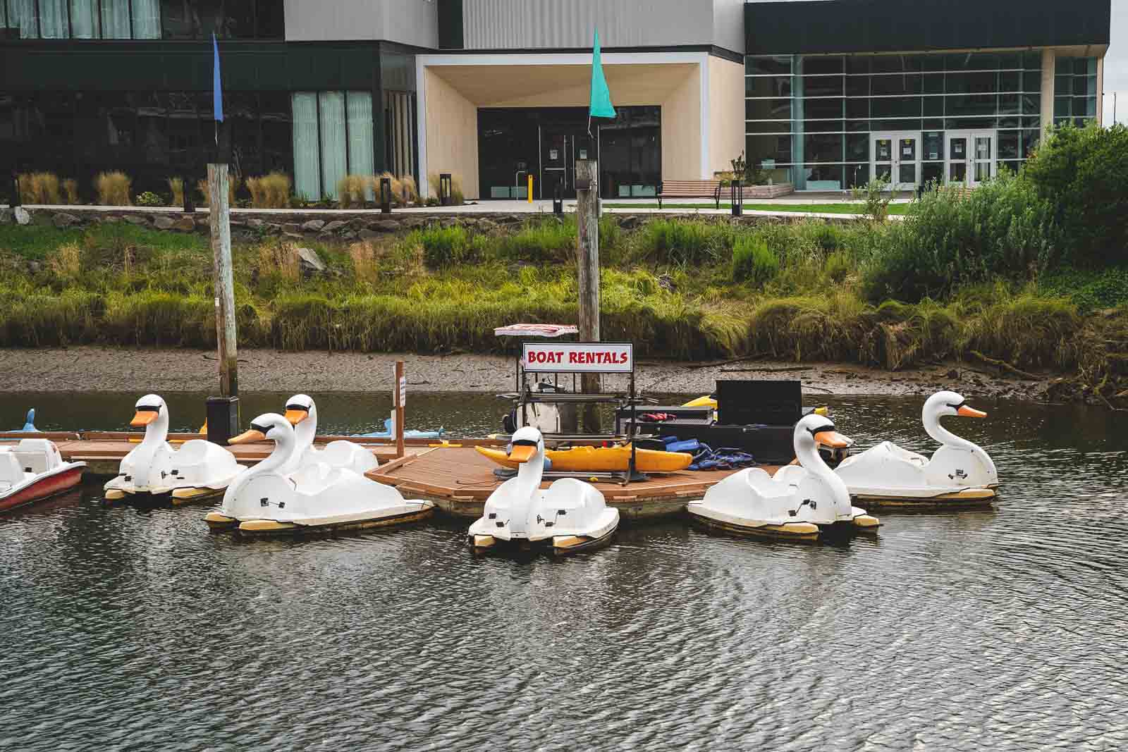Swan boats on the canal in Seaside - one of the best places to visit near Cannon Beach.
