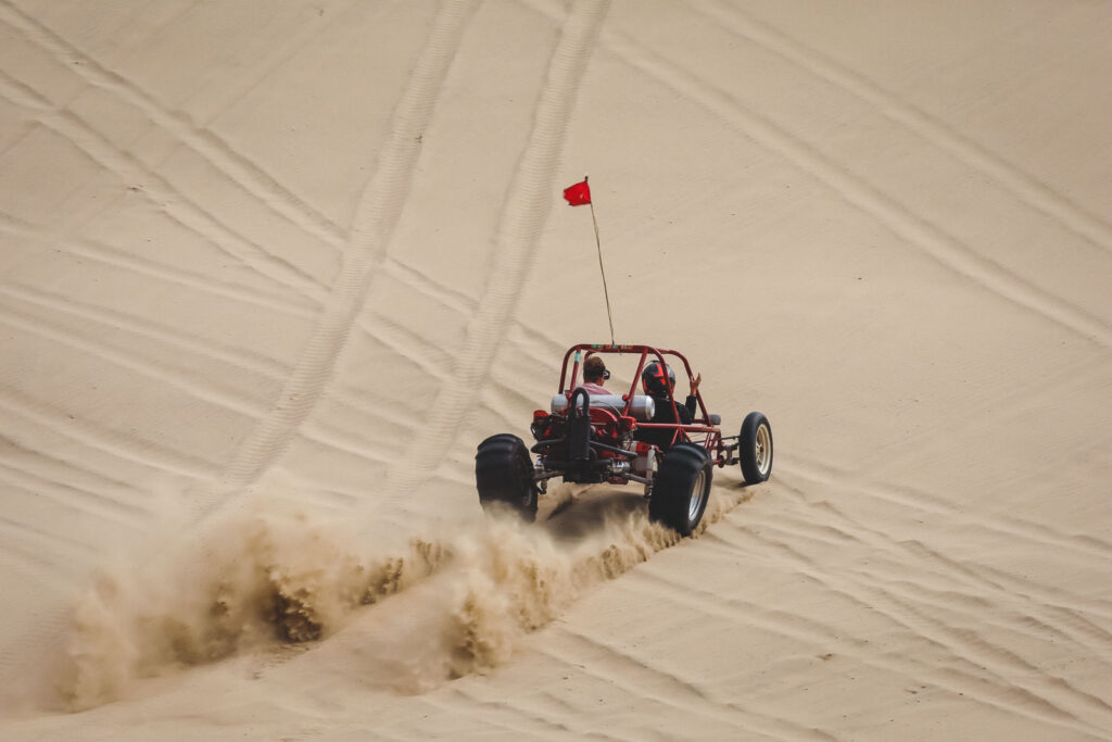 Dune buggy riding sand dunes at Sand Lake Recreation Area near Pacific City