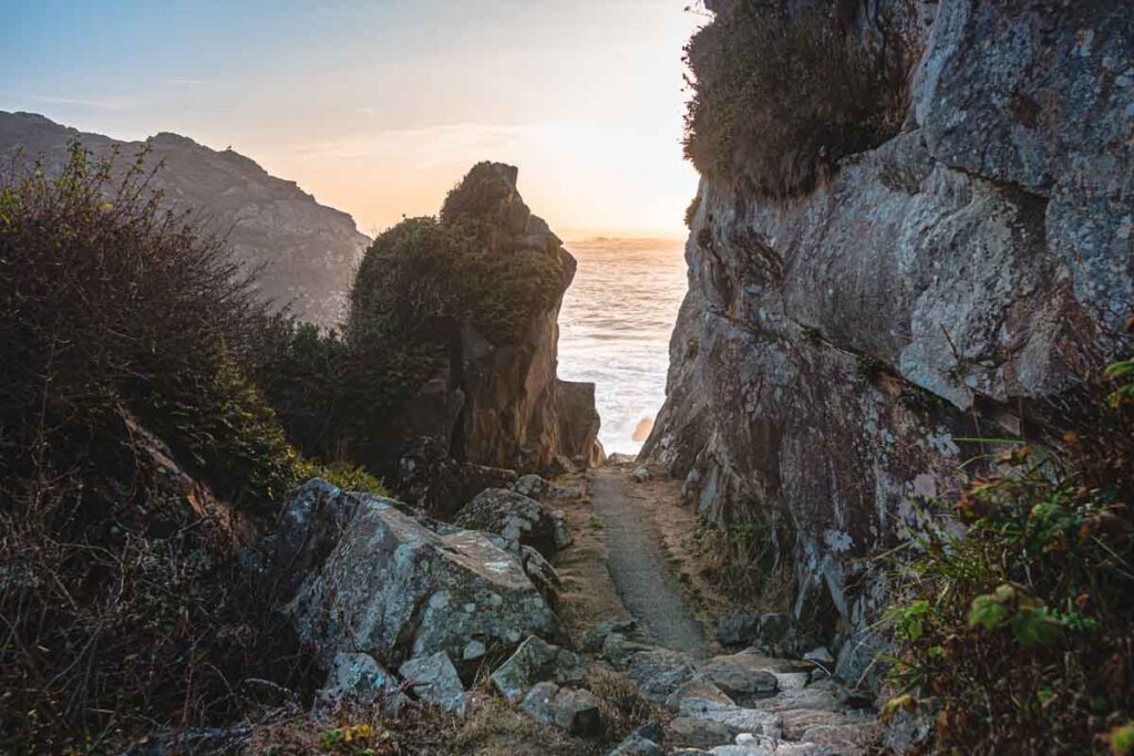 View of the sea between rocky cliffs in harris beach state park