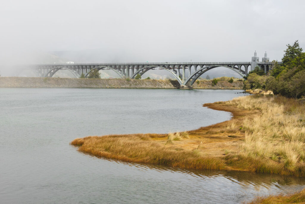 Mist covering bridge over Rogue River in Gold Beach