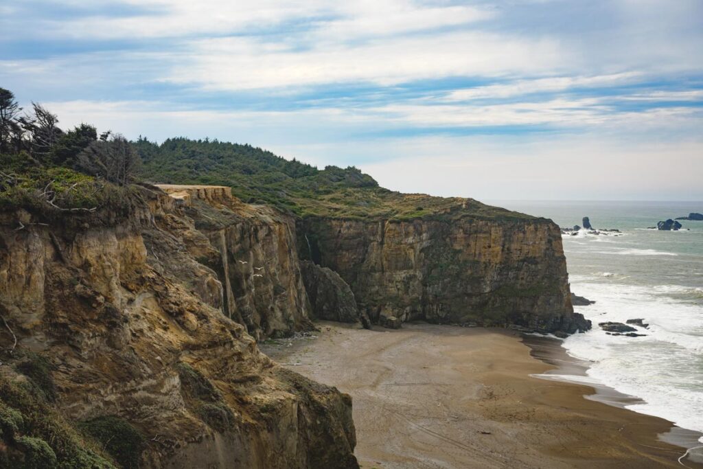 View over the cliffs on the Blacklock Point Trail in Floras Lake State Park