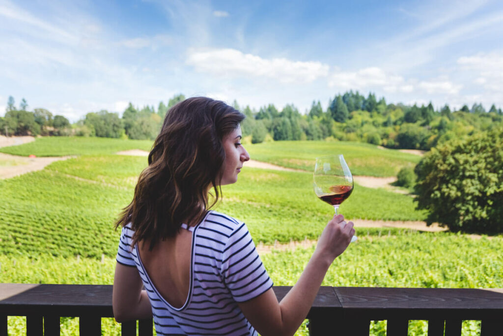 Girl drinking wine on Portland Oregon tours