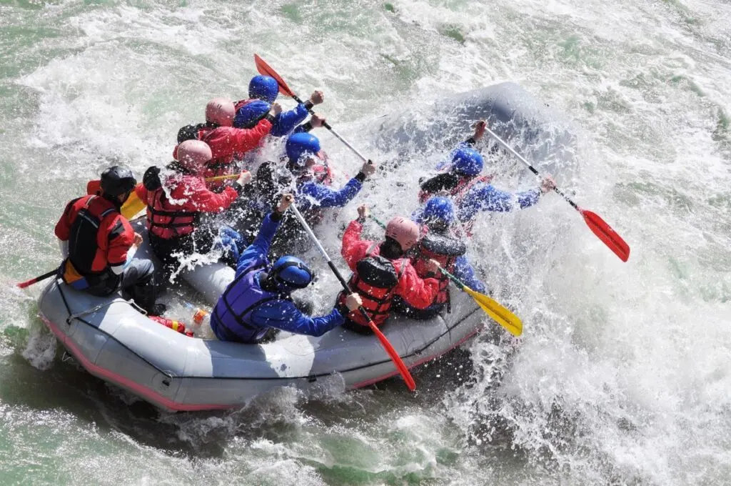 Group on rapids white water rafting in Oregon