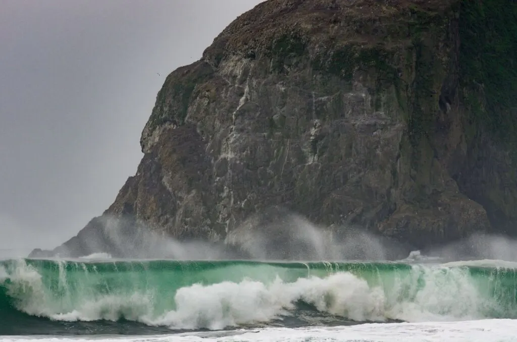 Waves at Monolith Rock during winter in Oregon