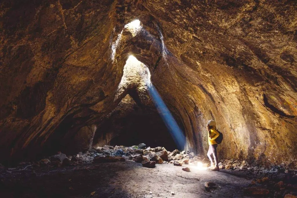 Hiker in Skylight Cave one of the best things to do in Sisters