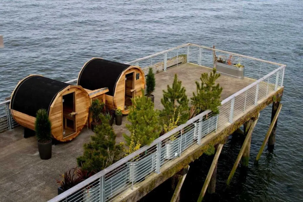 Two wooden saunas on the pier outside of the Bowline Hotel.