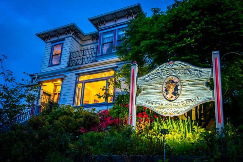 The exterior of the Clementine's Guest House in Astoria at blue hour.