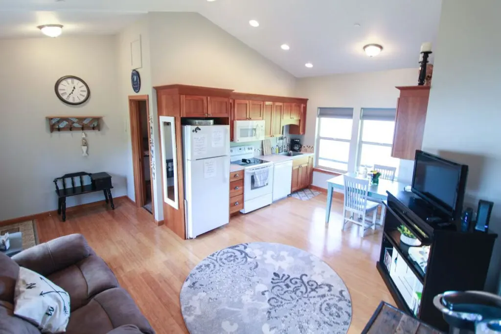 A wide view of the kitchen and living area of the Historic Astoria Home. A wide view of the kitchen and living area of the Historic Astoria Home.