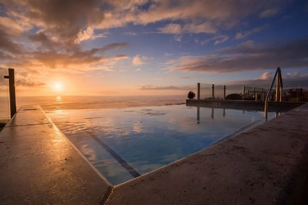Beautiful burning sunset over the pool area at the Inn at Nye Beach in Newport. Beautiful burning sunset over the pool area at the Inn at Nye Beach in Newport.