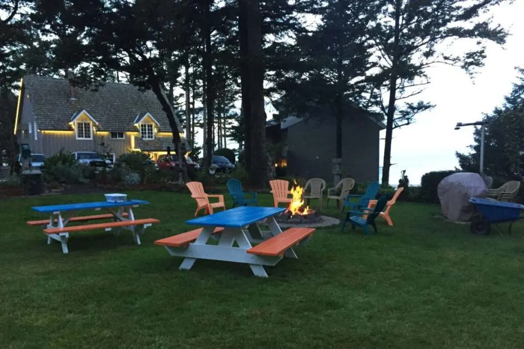 An in use fire pit and outdoor seating at Starfish Point.