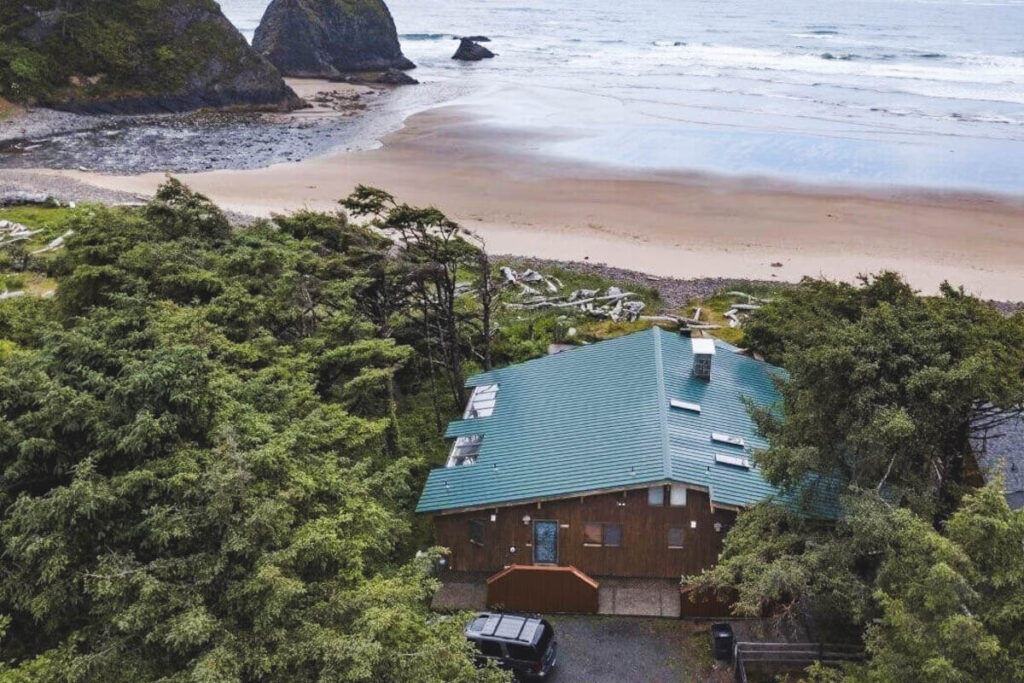 An aerial view of the Happy Clam Oceanfront Property and its vicinity to Cannon Beach.