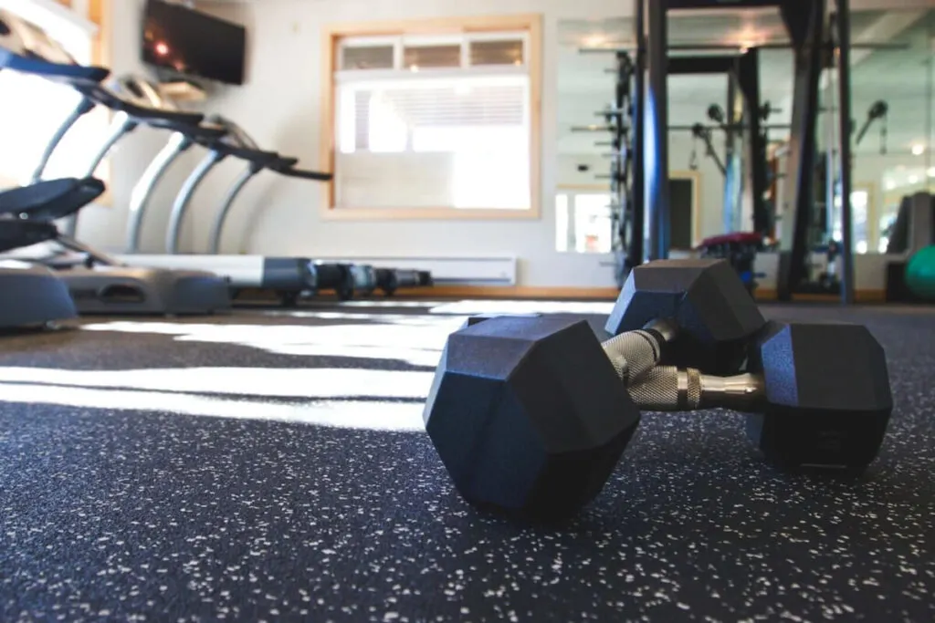 Dumbbells and treadmills in The Ocean Lodge gym.