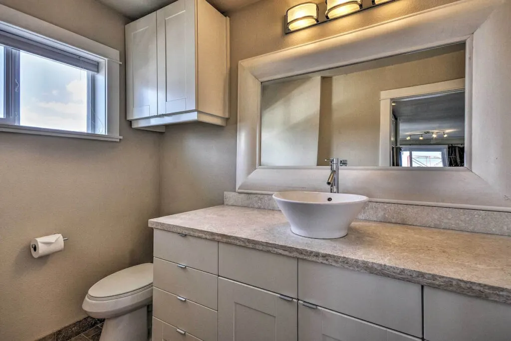 A simple yet modern bathroom inside the Waterfront Condo on the Pier.