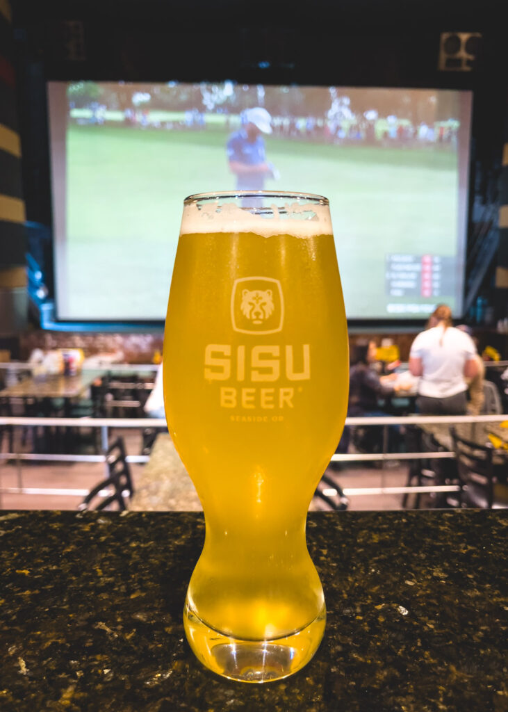 Pint of ale while watching gold at Sisu Brewing Co.