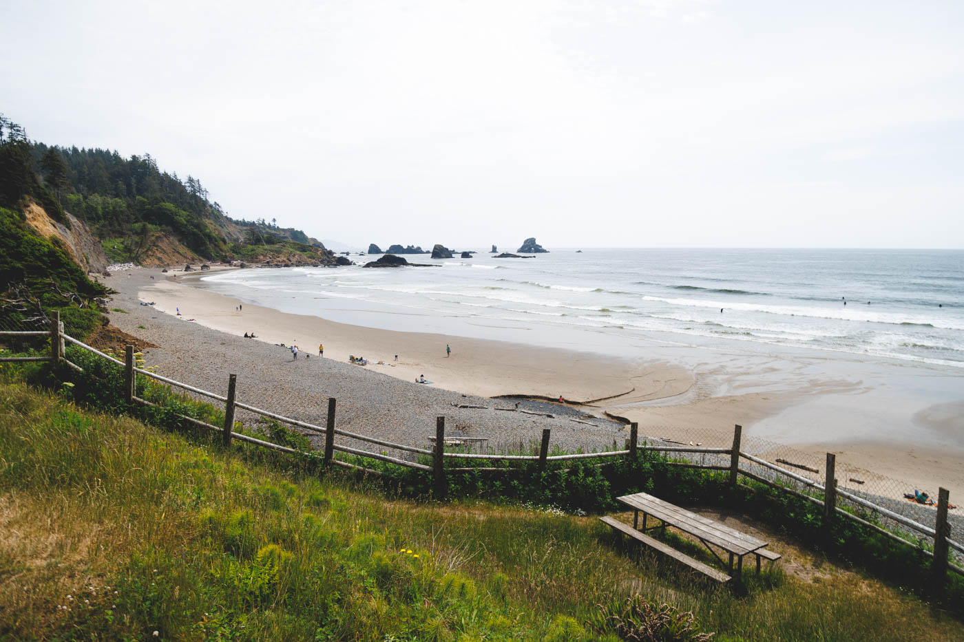 Tourists enjoying the day on Indian Beach in Ecola State Park.
