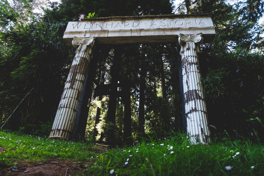 Old roman-style columns at the entrance of Shivley Park in Astoria.