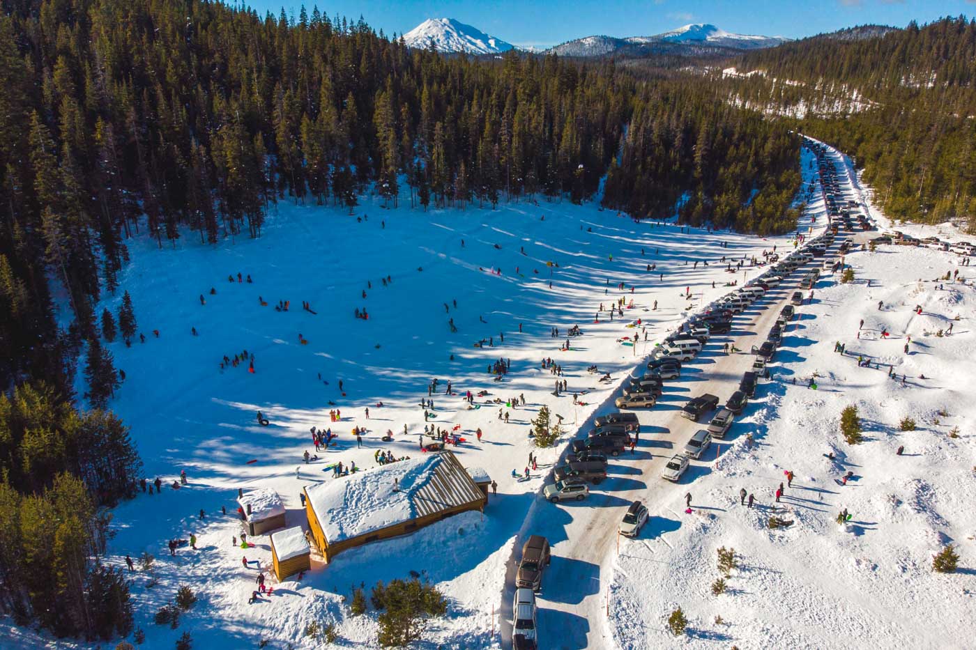 Crowds gathered at Wanoga Snow Park in Bend to participate in winter tubing.