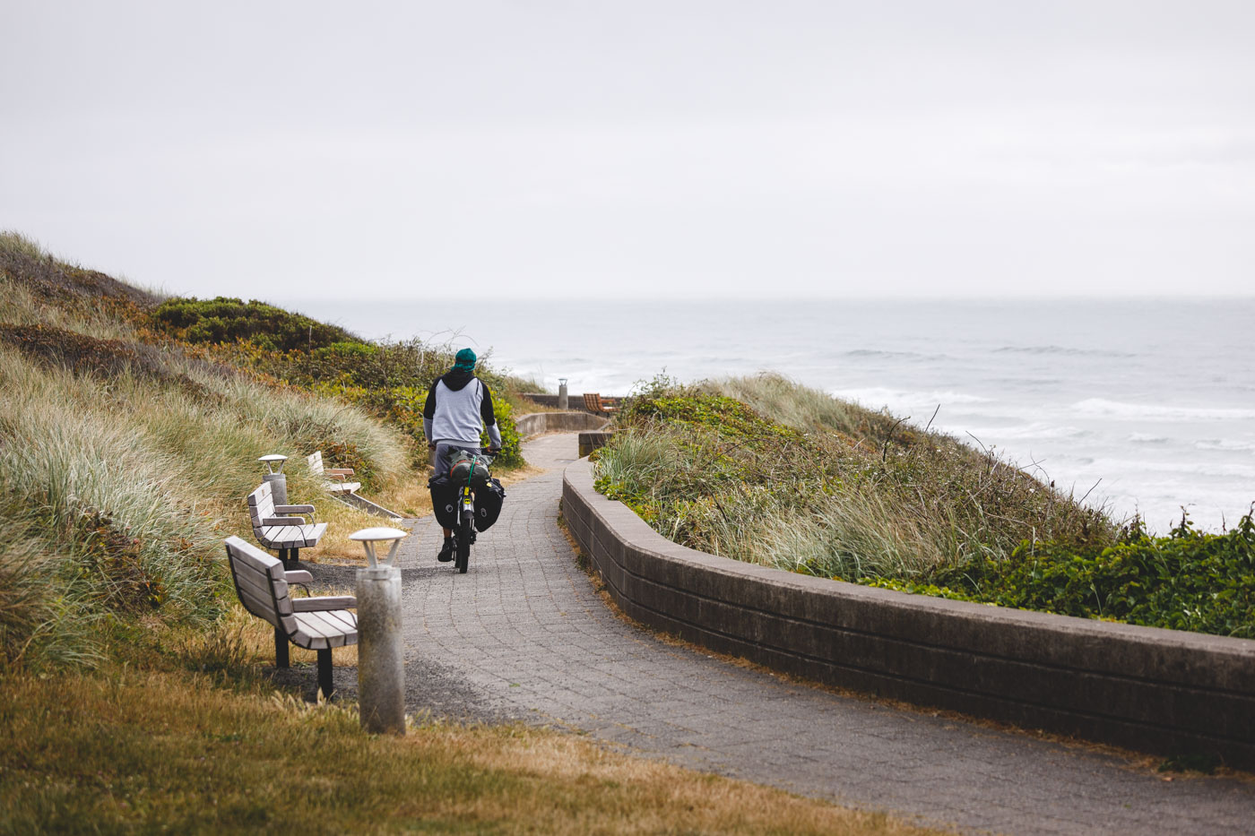 A cyclists along a coastal pathways in Don and Ann Davis Park in Newport.