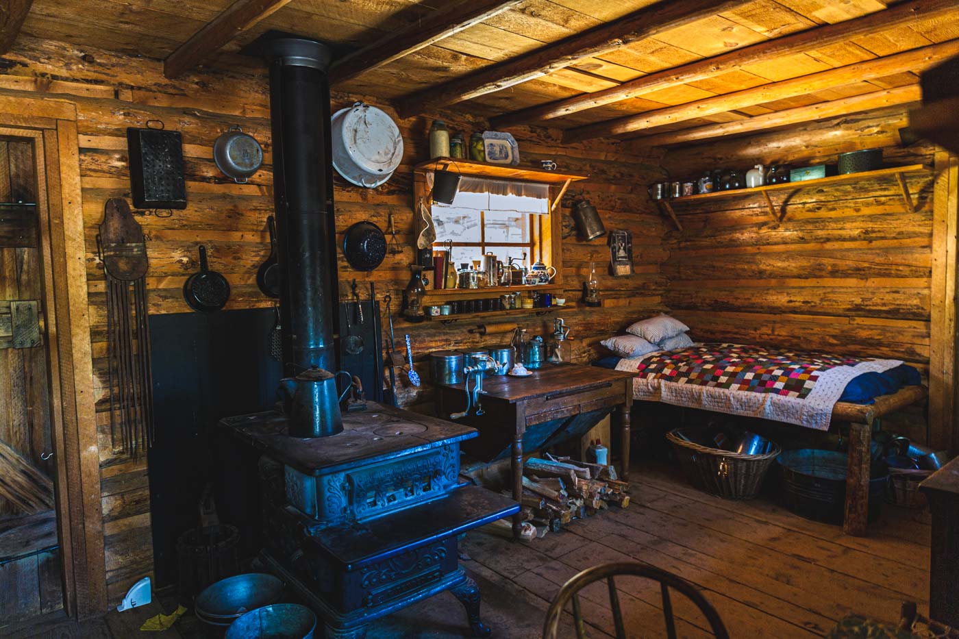 Cosy and traditional interior of a log cabin at the High Desert Museum in Bend.
