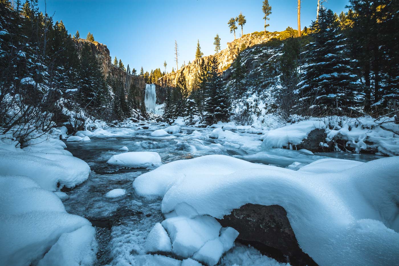 Tumalo Falls covered in ice and snow in Oregon.