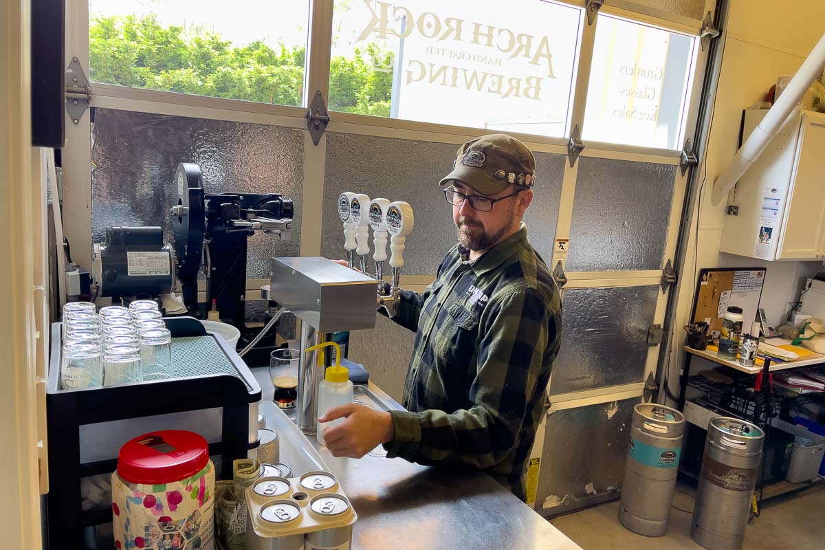 Arch Rock Brewing Company man pouring beer