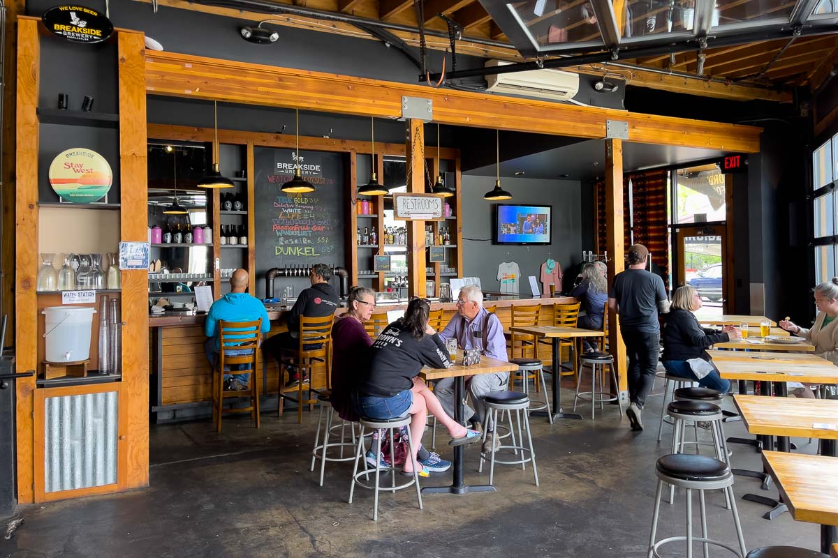 Breakside Brewery inside shot of table of people drinking.