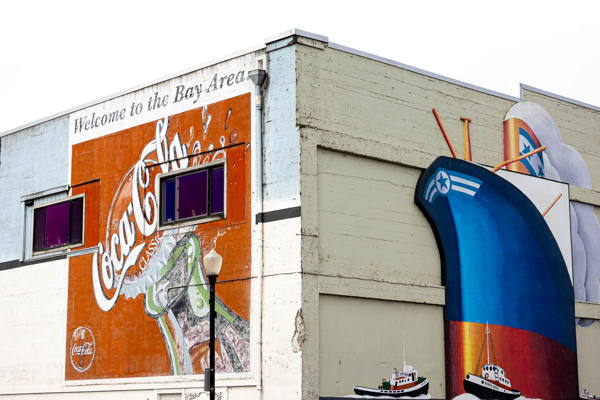 Coos Bay murual of ships and Cola Cola.